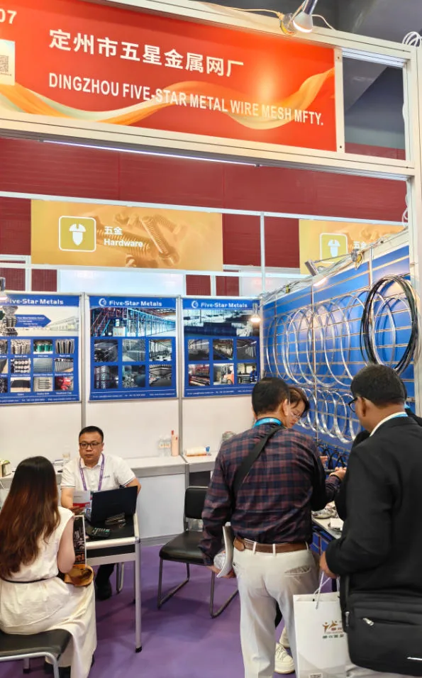International buyers at the mesh wall of Five Star Metal's Booth 13.1B07, 140th Canton Fair